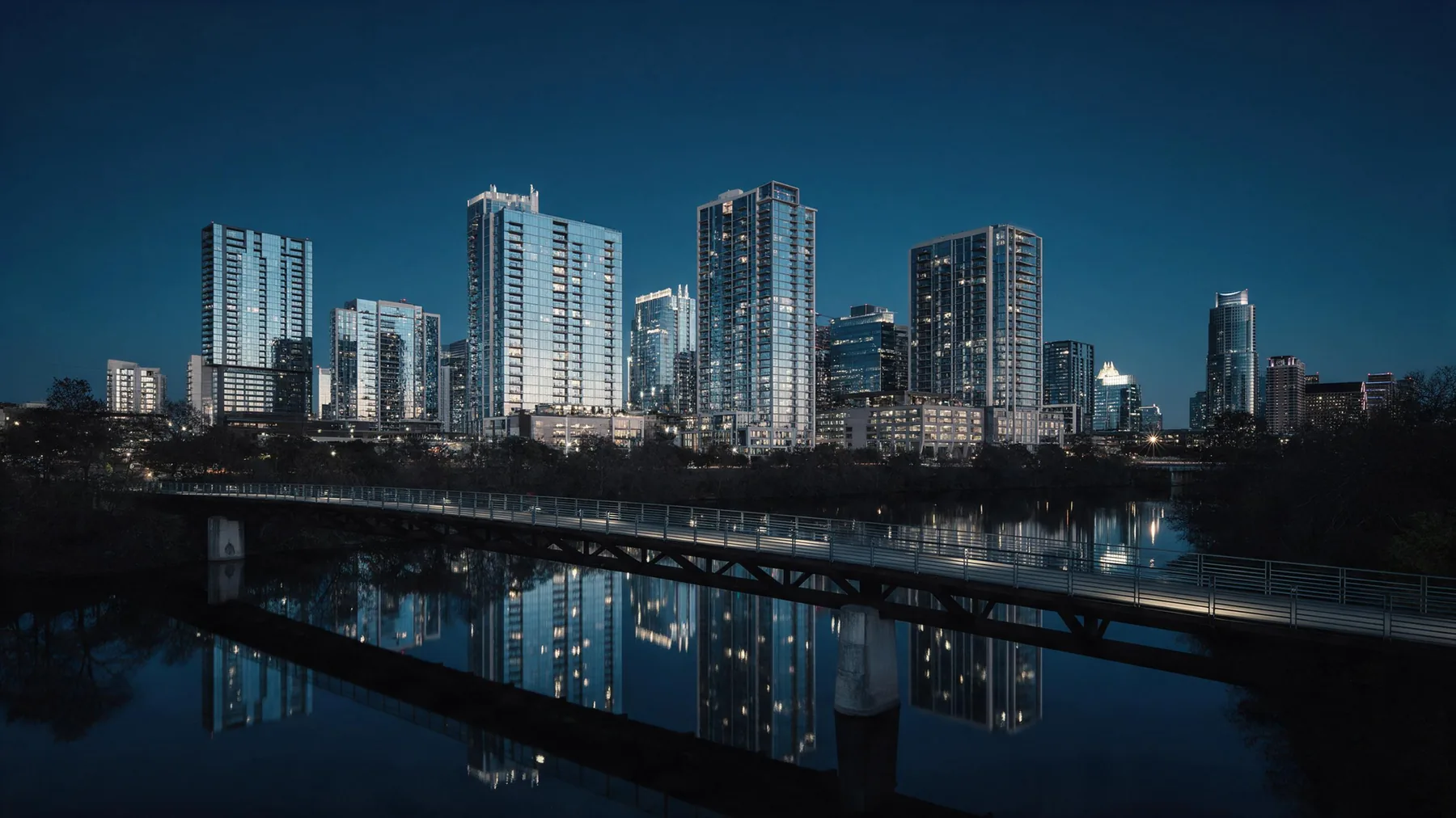 Austin, Texas downtown skyline at blue hour reflected in the river